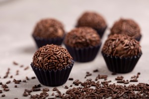 Brigadeiro
Brazil’s #1 sweet — rich chocolate fudge balls rolled in sprinkles.