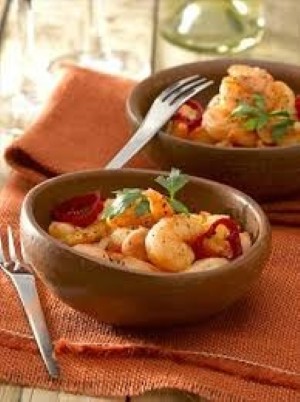 Camarones al Pil Pil 
Shrimp sautéed in garlic-chili oil, a coastal classic with a fiery touch.