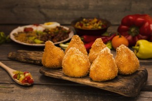 Golden Coxinhas
Chicken croquettes done right — golden, crunchy, and stuffed with savory shredded chicken.