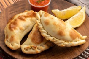 
Empanadas de Pino 
Traditional turnovers stuffed with spiced beef, olives, and hard-boiled egg.