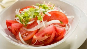 Ensalada Chilena 
Refreshing tomato and onion salad with lemon juice and cilantro.