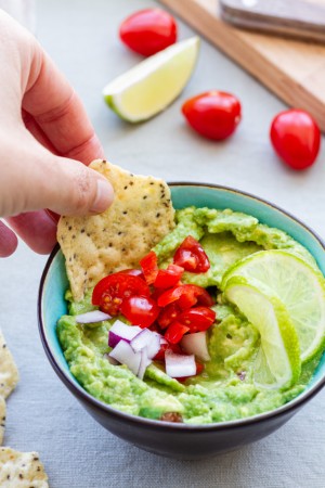 Extra zesty Guacamole 
 Freshly mashed avocados blended with tomatoes, red onions, and jalapeño, accented by lime and cilantro for balanced richness.