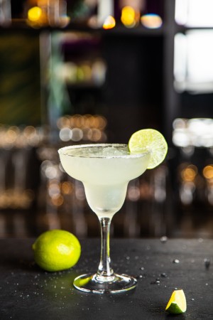 Lime Margarita 
 A timeless cocktail of premium tequila, fresh lime juice, and agave nectar, served over ice with a perfectly salted rim.