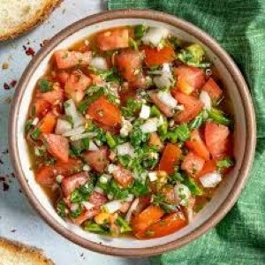 Pebre & Marraqueta Bites 
Fresh tomato salsa spooned over crusty marraqueta bread.