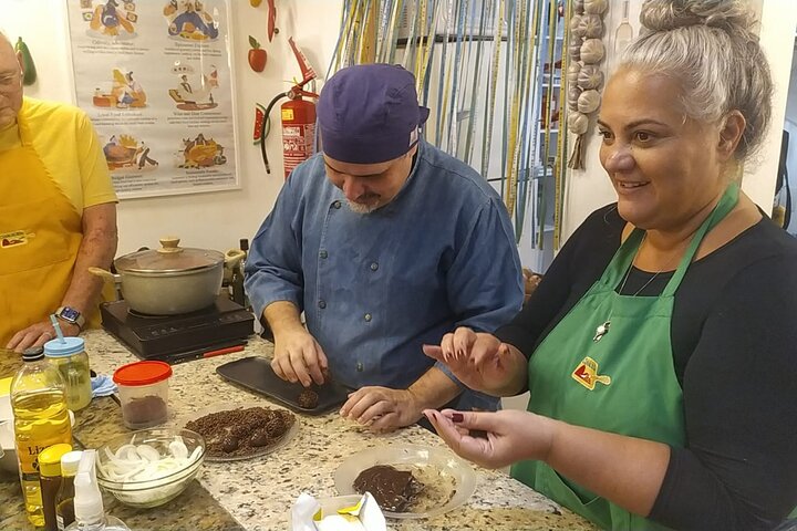 Cook, eat and drink before you fly: Brazilian cooking class near salvador airport